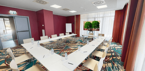 Bright, Modern Meeting Space With Creative Flair and Floor-To-Ceiling Windows