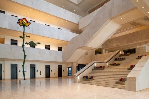 Marble-Finished Atrium With Grand Staircase for Cocktail Receptions