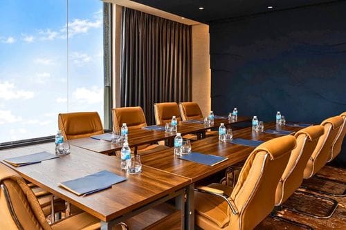 Neutral Beige Boardroom With Skyline Views for Executive Meetings