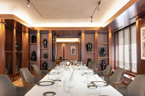 Refined Dining Salon With Walnut Chevron Parquet for Pre-dinner Cocktails