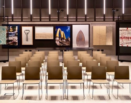 Art-Filled Industrial Gallery With Led Accents for Corporate Mixers
