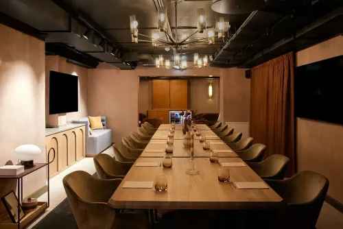 Modern Scandinavian Meeting Room With Urban Charm for Client Meetings and Workshops