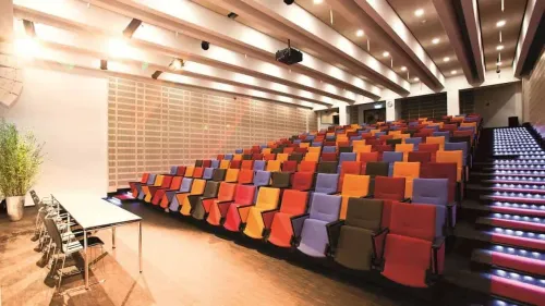 High-Tech Auditorium With Colourful Ergonomic Seating for Dynamic Events