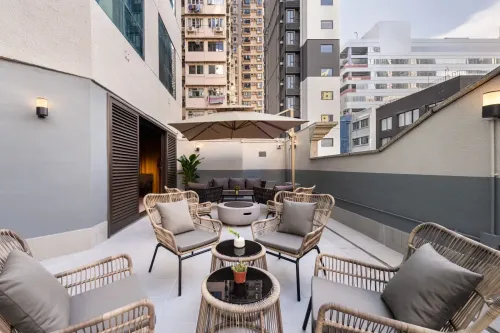 Cosy Courtyard With Stylish Furniture and a Relaxed Ambience for Mixers