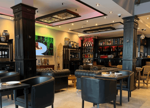 Velvet Lounge With Marble Floors and Sleek Bar for Receptions