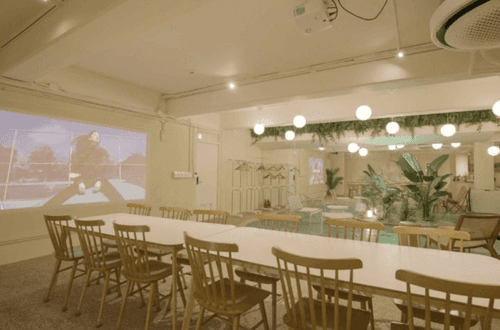 Chic Coastal Event Venue With Glowing Colours and Beachy Vibes Interior