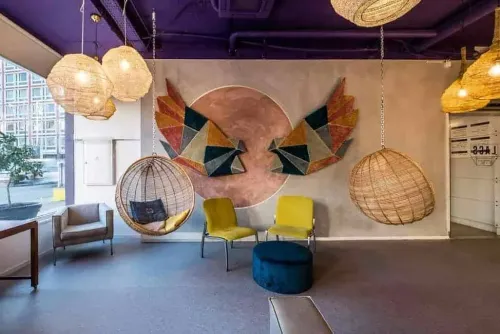 Quirky Vibrant Venue With a Striking Geometric Wall Art for Creative Affairs