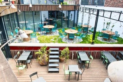 Lush Courtyard and Industrial Deck for Unforgettable Gatherings