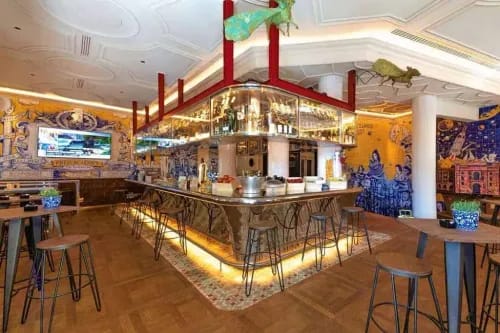 Vibrant Spanish Tavern With Bold Murals for Dynamic Celebrations