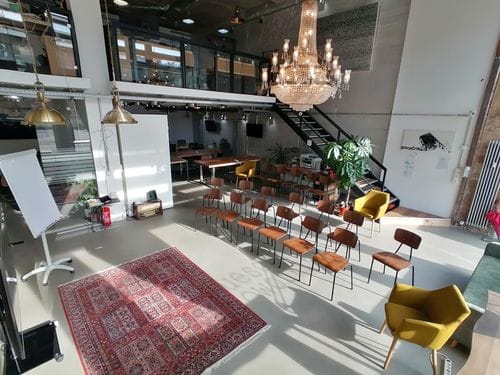 Chic Two-Level Loft With Crystal Chandelier for Innovative Corporate Affairs