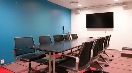 Vibrant Intimate Boardroom for Productive Small-Scale Meetings