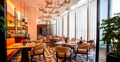 Multi-Cuisine Dining Hall With Bar for Stylish Celebrations