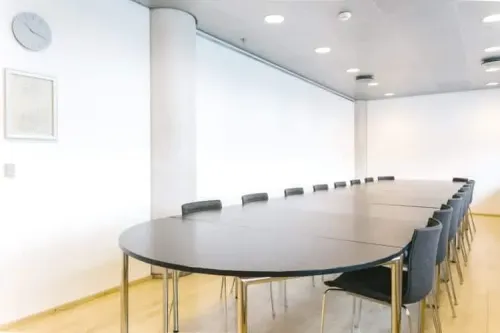 Sleek Nordic Boardroom with Waterfront Views for Intimate Meetings