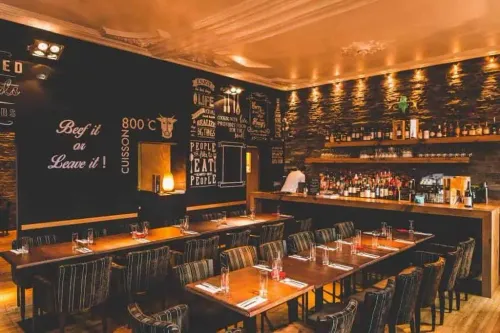 Warm Industrial Brasserie With Artistic Walls for Elegant Private Gatherings