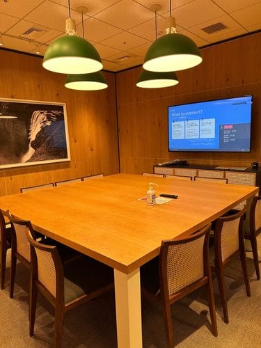 Elegant Room With Wooden Interior and Waterfall Art for Work Sessions