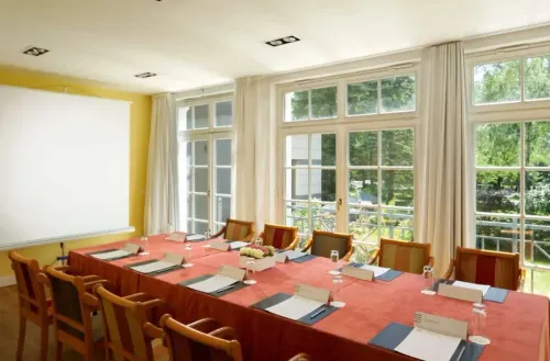 Sunlit Boardroom With a Scenic Terrace for Sophisticated Gatherings