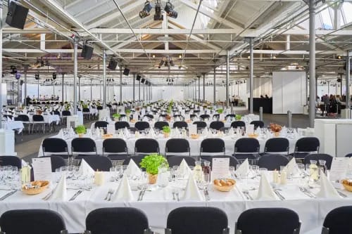 5,500 Sqm Industrial Hall With Exposed Trusses and Expansive Outdoor Space for Large-Scale Events