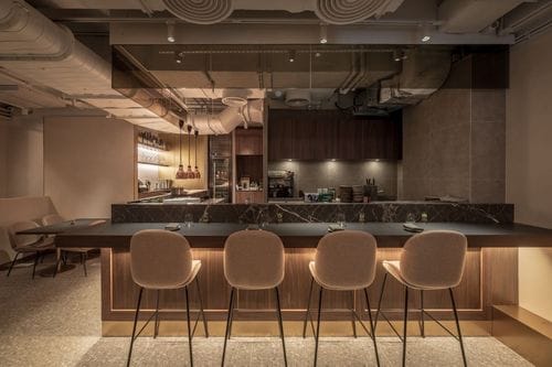 Sleek Dining Space With Earthy Textures for Exclusive Gatherings