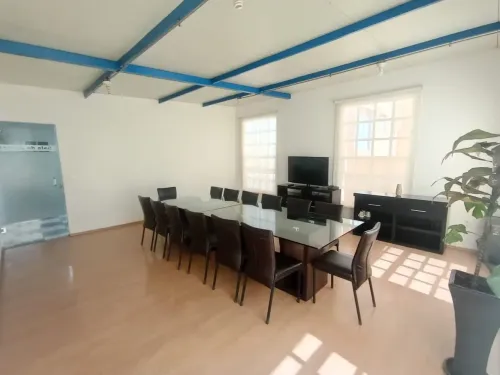 Minimalist Boardroom With Clear Glass Table for Corporate Collaborations