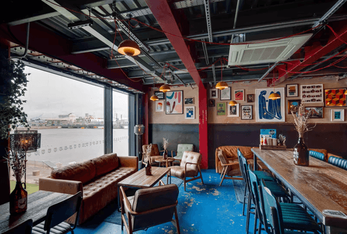 Industrial Bar With River Views for Relaxed Socials