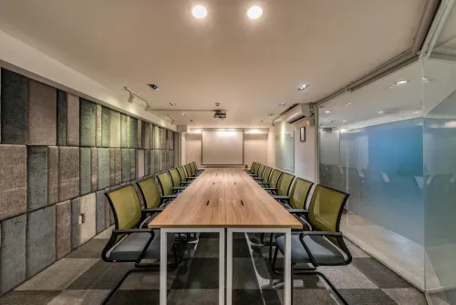 Contemporary Conference Room With Acoustic Panels and Muted Hues for Strategic Planning
