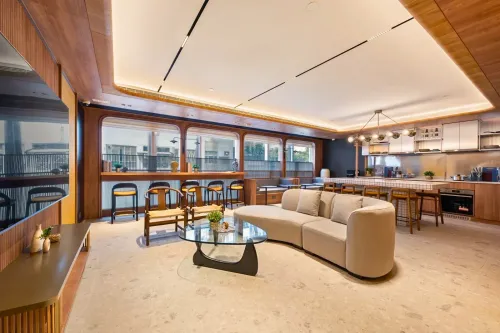 Vibrant Social Lounge With Warm Wood and Kitchen for Happy Hours and Shoots 