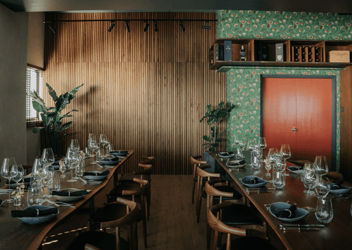 Tropical Theme Resto With Bold Wood Accents for Intimate Dinners and Gatherings