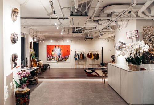 Eclectic Industrial Gallery With African Art Installations for Creative Workshops and Networking