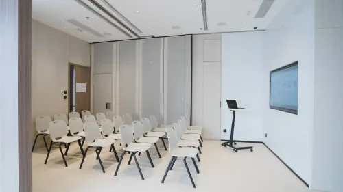 Minimalist Conference Room With Integrated Screen for Meetings