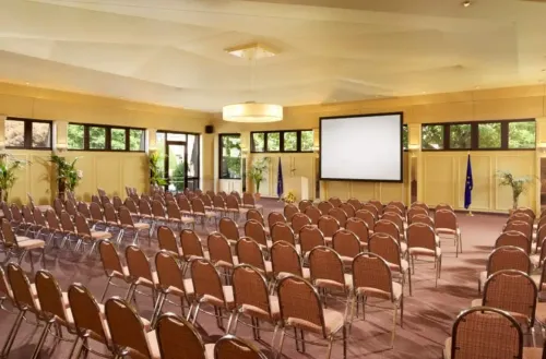 Panoramic Event Hall With Warm Lighting for Grand Conferences