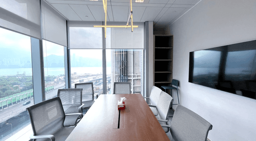 Sleek Modern Meeting Room With Large Window for City Scape Views for High-End Business Meetings