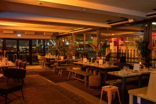 Floating Waterfront Venue With a Rustic Charm for Energising Social Mixers