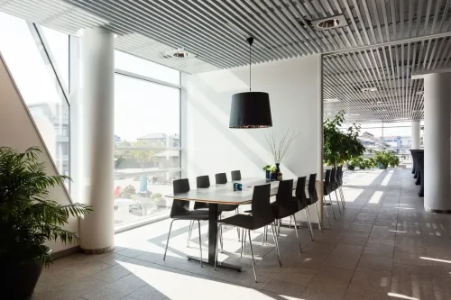 Glass-Walled Meeting Suite With Floor-To-Ceiling Windows for Team Briefings and Strategy Sessions
