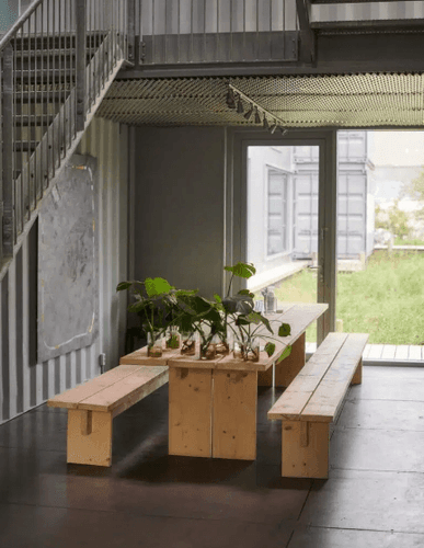 Modular Container Hub With Courtyard Access for Creative Sessions