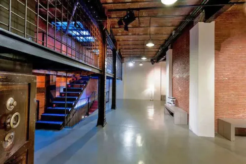 Dynamic Industrial Venue With Sleek Iron Accents for Immersive Gatherings