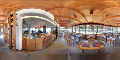 Timber-Clad Restaurant With Panoramic Windows and Boundless Outdoor Space for Bespoke Gatherings