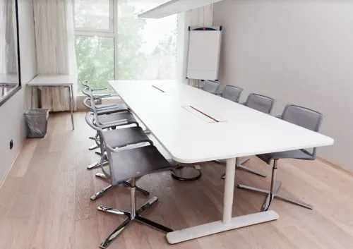 Bright Minimalist Meeting Room for Intimate Strategic Gatherings