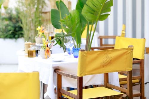 Coastal-Style Terrace With Vibrant Furniture and 360° Views for Seasonal Celebrations