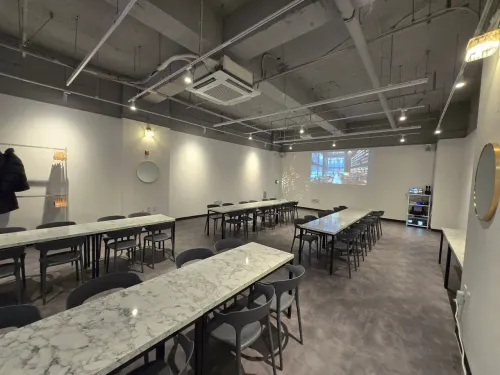 Marble-Topped Industrial Room With Grey Tones for Private Workshops and Social Hours