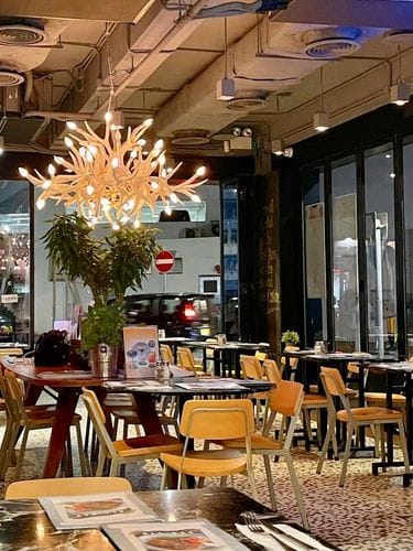 Rustic Dining Haven With Antler Chandelier and Urban Vibes for Bespoke Celebrations