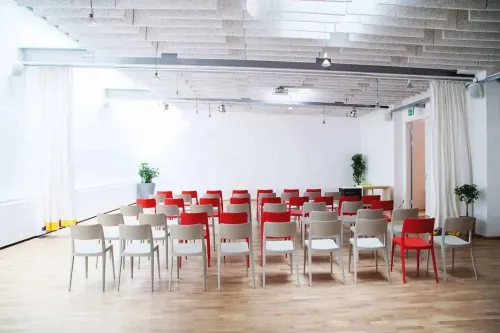 Sleek Minimalist Venue With Striking Acoustic Panels for Dynamic Events