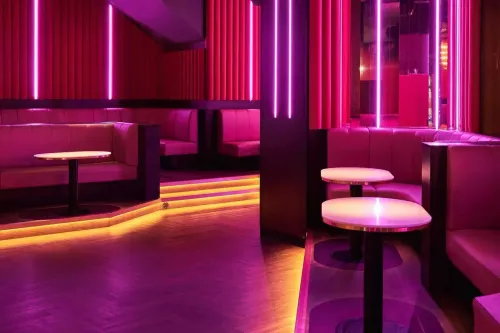 Retro-Futuristic Club With Neon Glows for Sophisticated Celebrations