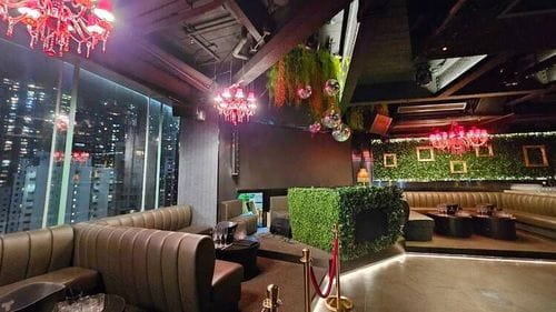 Luxe Urban Nightclub With Leather Booths and City Skyline Views for Exclusive Parties