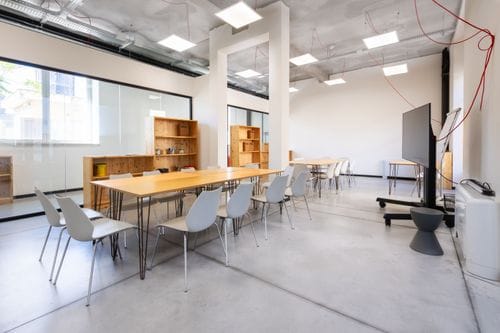 Bright and Minimalist Loft With Raw Aesthetics for Workshops and Seminars
