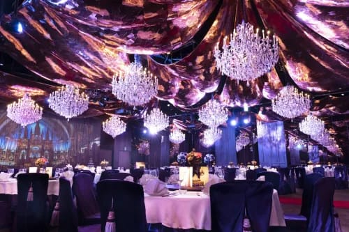 Lavish Ballroom With Dramatic Drapes and Crystal Chandeliers for Grand Gala Nights