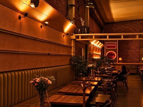 Dark-Lit Vinyl Bar With Terrace for Team Celebrations