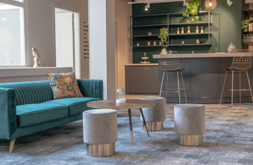 Mid-Century Lounge With Plush Seating and Curved Bar Counter