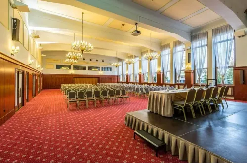 Majestic Socialist Realist Hall With Opulent Chandeliers for Grand Conferences 