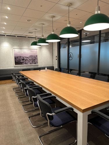 Industrial-Chic Space With Oak Finish and Green Lighting for Workshops