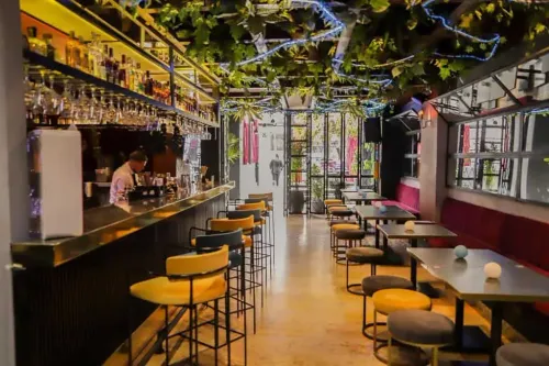 Aesthetical Industrial Oasis With Botanical Elegance for Sophisticated Events